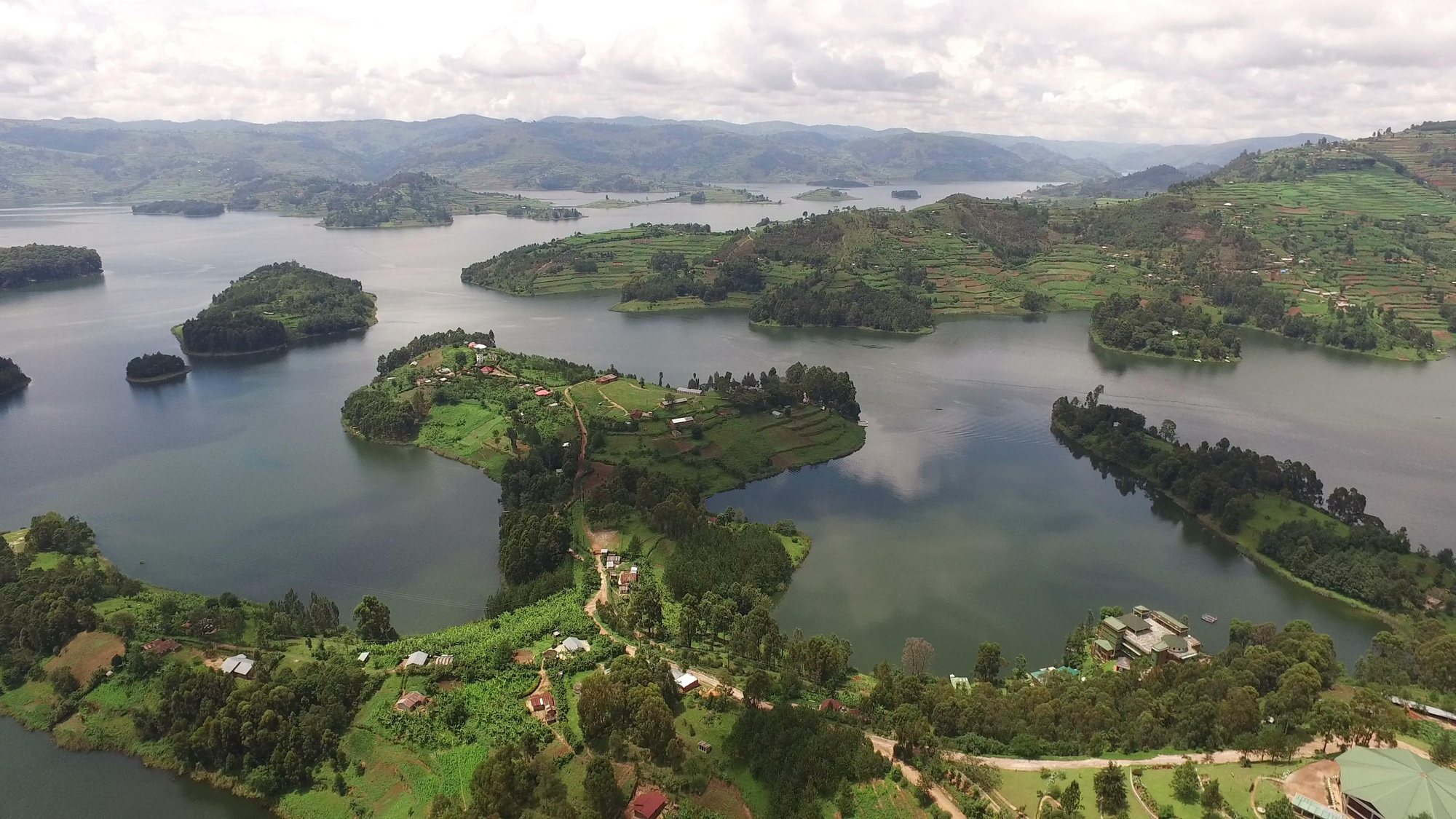 Aerial view of Lake Bunyonyi, its terraced hillsides and scattered green islands